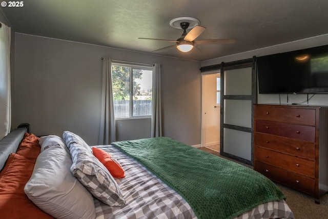 4033 Hanna St, Roseburg, OR 97471 - bedroom with carpet floors, a barn door, and ceiling fan