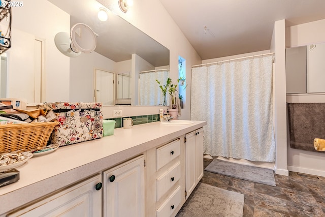 full bathroom with a shower with shower curtain and vanity