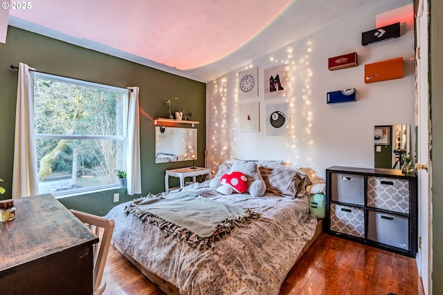 bedroom featuring wood-type flooring