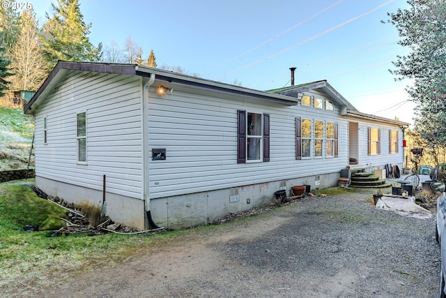 view of property exterior featuring crawl space