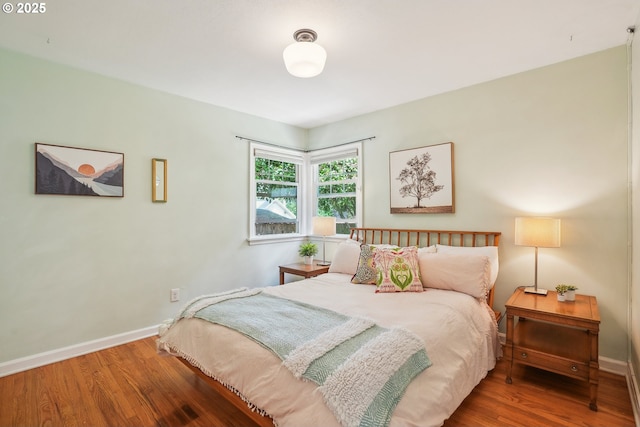 6134 NE 25th Ave, Portland, OR 97211 - bedroom featuring wood finished floors and baseboards