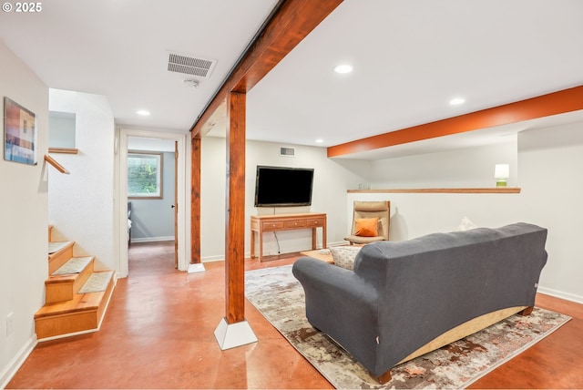 6134 NE 25th Ave, Portland, OR 97211 - living area featuring baseboards, recessed lighting, stairs, and finished concrete flooring
