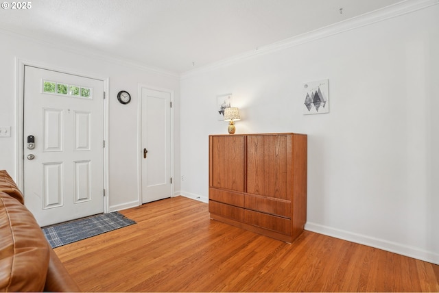 6134 NE 25th Ave, Portland, OR 97211 - entrance foyer with light wood-type flooring, ornamental molding, and baseboards