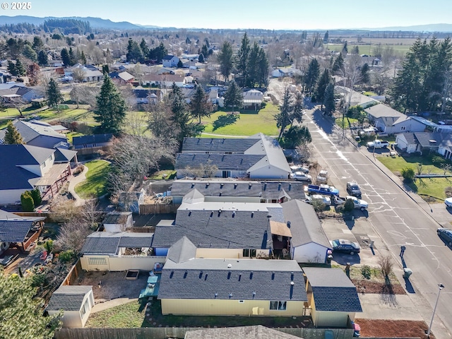 birds eye view of property featuring a mountain view