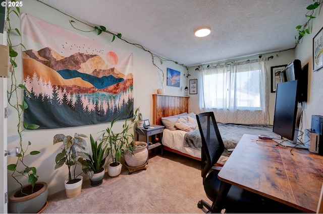 carpeted bedroom featuring a textured ceiling