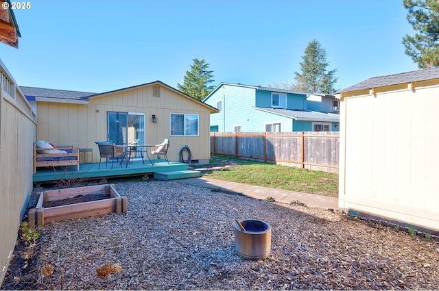 view of yard featuring a wooden deck