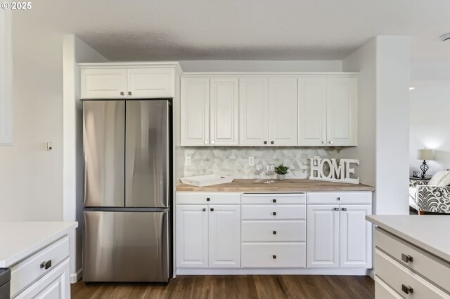 1189 S Aspen Way, Canby, OR 97013 - kitchen with stainless steel appliances, a sink, a peninsula, and plenty of natural light