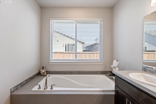 1939 Branch Creek Dr, Longview, WA 98632 - full bathroom featuring vanity, healthy amount of natural light, and a bath