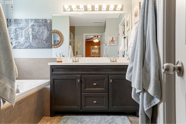 216 Churchill Downs St, Albany, OR 97322 - full bathroom featuring double vanity, a bath, and ceiling fan