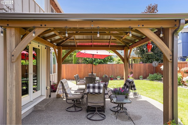 216 Churchill Downs St, Albany, OR 97322 - view of patio with a gazebo, outdoor dining space, and french doors