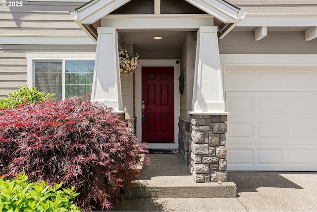 216 Churchill Downs St, Albany, OR 97322 - property entrance with a garage and stone siding
