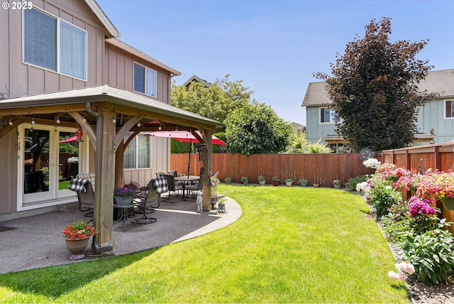 216 Churchill Downs St, Albany, OR 97322 - fenced backyard with french doors and a patio