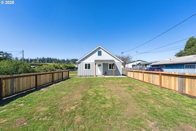 rear view of property with board and batten siding