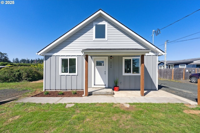 bungalow-style house with board and batten siding
