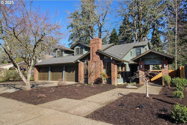 view of front of home featuring brick siding, a chimney, a garage, and roof with shingles