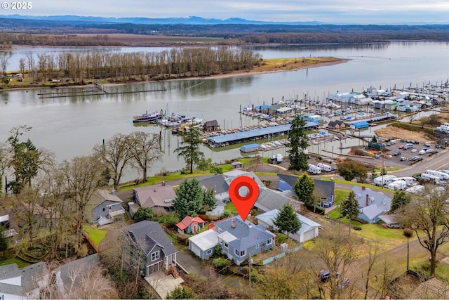 aerial view with a residential view and a water and mountain view