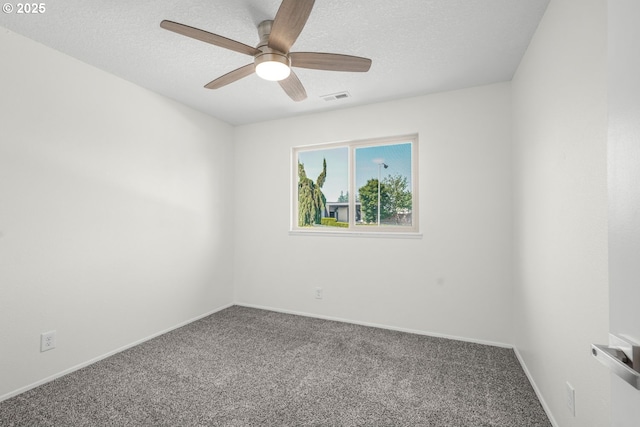 12510 SE Stark St Unit H, Portland, OR 97233 - spare room with carpet flooring, ceiling fan, a textured ceiling, and baseboards