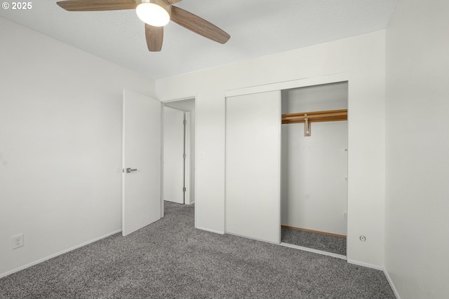 12510 SE Stark St Unit H, Portland, OR 97233 - unfurnished bedroom featuring carpet flooring, a closet, ceiling fan, and baseboards