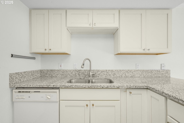 12510 SE Stark St Unit H, Portland, OR 97233 - kitchen featuring white dishwasher, a sink, and light stone counters