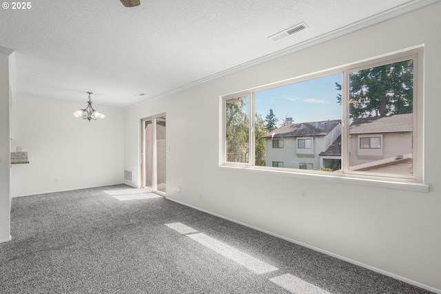 12510 SE Stark St Unit H, Portland, OR 97233 - unfurnished room with a chandelier, carpet floors, and a textured ceiling