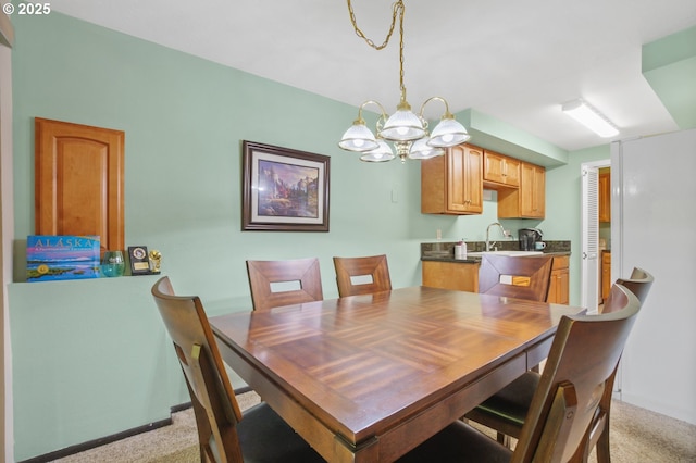 dining space with light carpet and an inviting chandelier