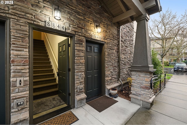 8844 NE Brentford Way, Hillsboro, OR 97006 - property entrance with covered porch and stone siding