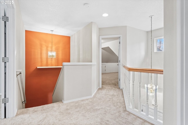 2462 NE 11th Ave, Hillsboro, OR 97124 - hall featuring an upstairs landing, carpet, a chandelier, and baseboards