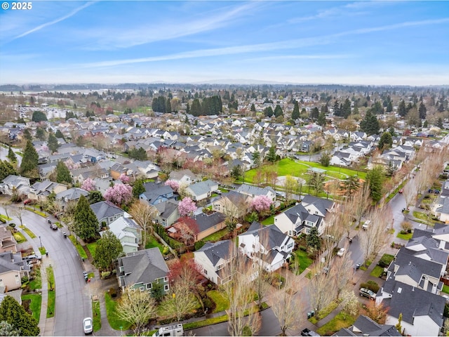 2462 NE 11th Ave, Hillsboro, OR 97124 - aerial view of property and surrounding area featuring nearby suburban area