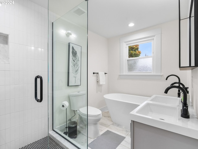 full bathroom featuring shower with separate bathtub, vanity, and toilet