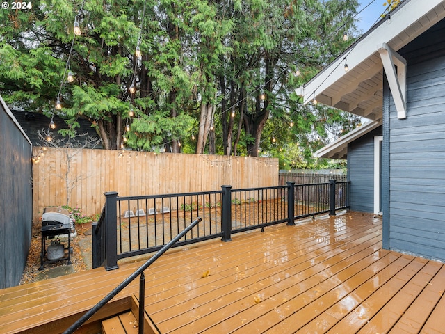 wooden terrace with grilling area