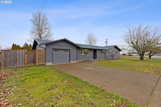 single story home with a front yard and a garage