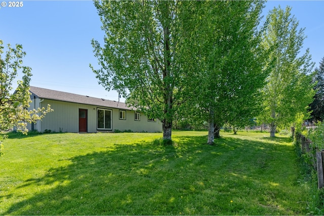 view of yard with fence