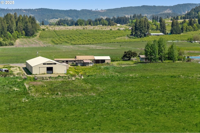 bird's eye view with a rural view and a mountain view