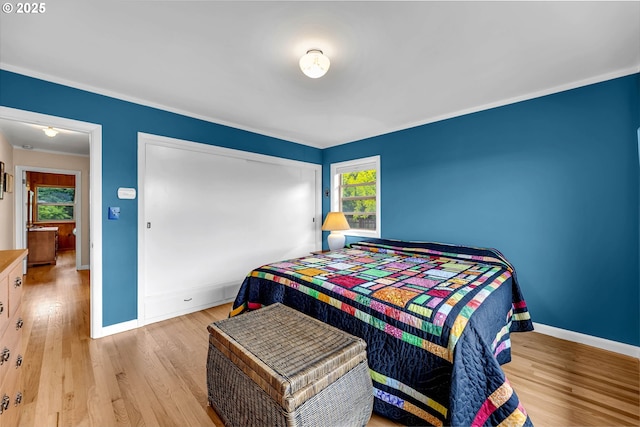 1815 SE 97th Ave, Vancouver, WA 98664 - bedroom with baseboards, wood finished floors, ornamental molding, and a closet