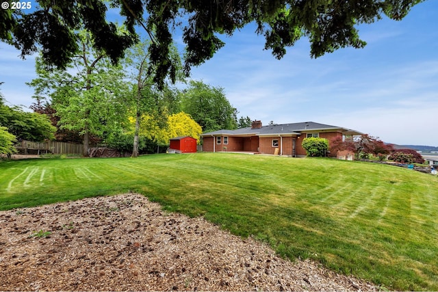 1815 SE 97th Ave, Vancouver, WA 98664 - view of yard with a storage shed and an outbuilding