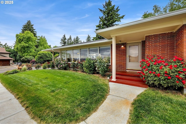 1815 SE 97th Ave, Vancouver, WA 98664 - property entrance featuring a yard and brick siding