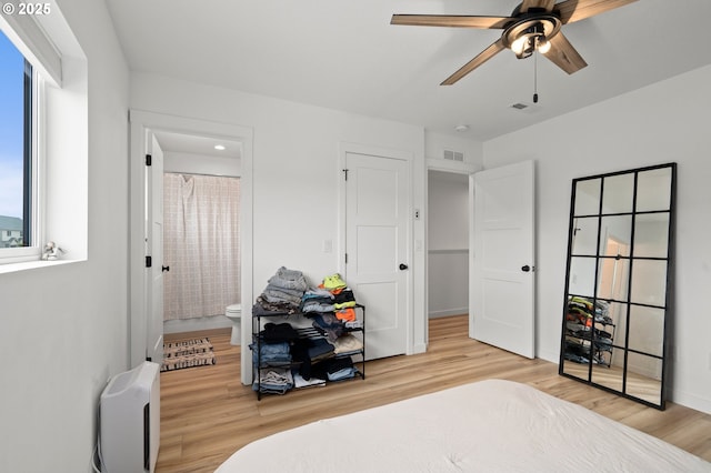 1013 Peach Rd, Winlock, WA 98596 - bedroom featuring wood finished floors and ensuite bathroom