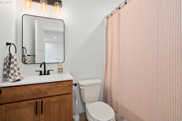 1013 Peach Rd, Winlock, WA 98596 - full bathroom with vanity, toilet, and a shower with shower curtain
