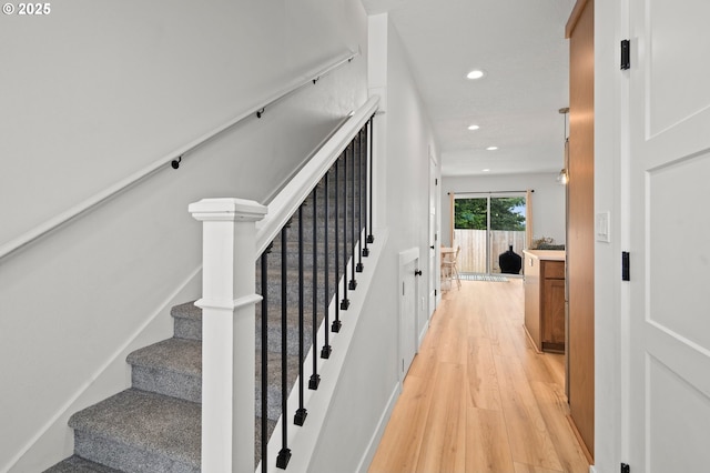 1013 Peach Rd, Winlock, WA 98596 - staircase featuring wood finished floors and recessed lighting