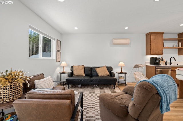 1013 Peach Rd, Winlock, WA 98596 - living area featuring recessed lighting, a wall unit AC, and light wood-style flooring