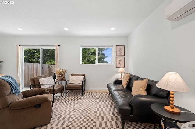 1013 Peach Rd, Winlock, WA 98596 - living area featuring a wall mounted air conditioner, tile patterned floors, recessed lighting, and baseboards