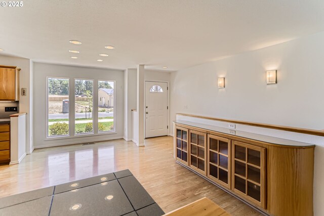 7471 SW Woodbury Loop, Wilsonville, OR 97070 - entrance foyer with light wood-type flooring and recessed lighting