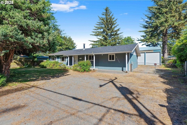 91256 Cape Arago Hwy, Coos Bay, OR 97420 - ranch-style home featuring an outdoor structure and a garage
