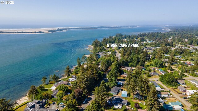 91256 Cape Arago Hwy, Coos Bay, OR 97420 - aerial overview of property's location with a large body of water and nearby suburban area