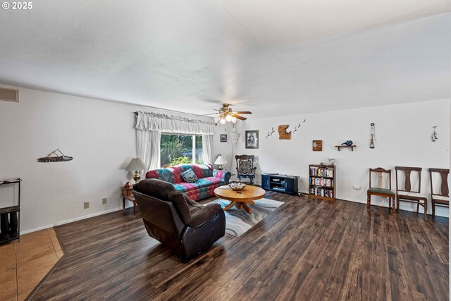 91256 Cape Arago Hwy, Coos Bay, OR 97420 - living area with wood finished floors, ceiling fan, and baseboards