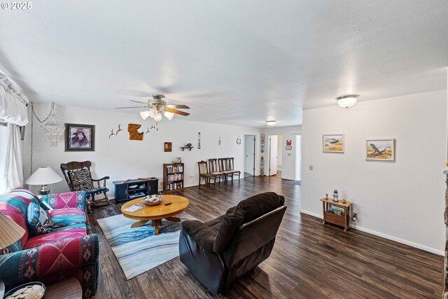 91256 Cape Arago Hwy, Coos Bay, OR 97420 - living room with wood finished floors, ceiling fan, and baseboards