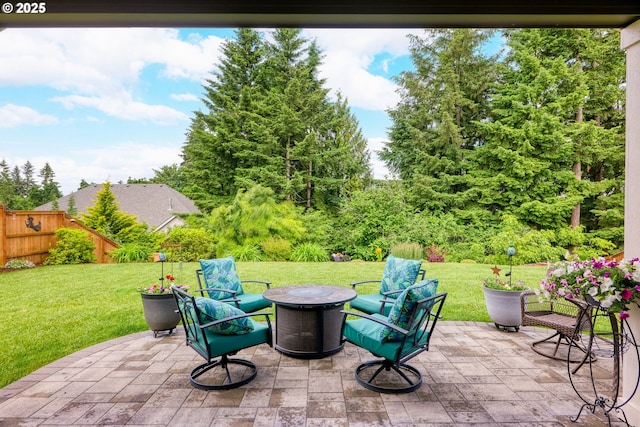 view of patio / terrace with a fire pit