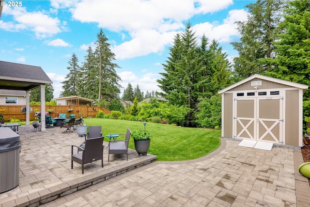 view of patio / terrace with a storage shed