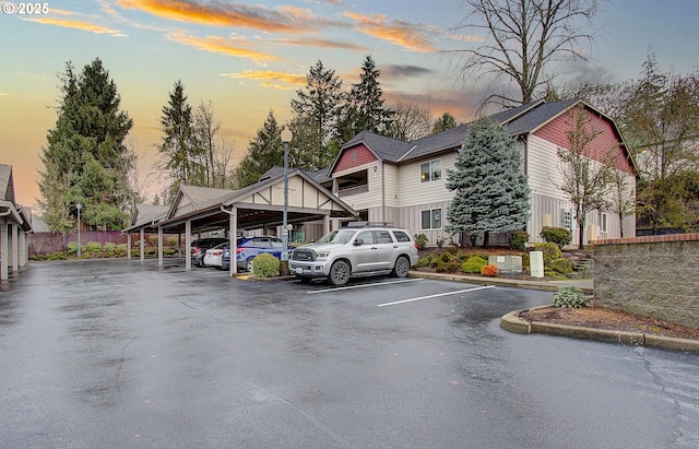 view of parking at dusk