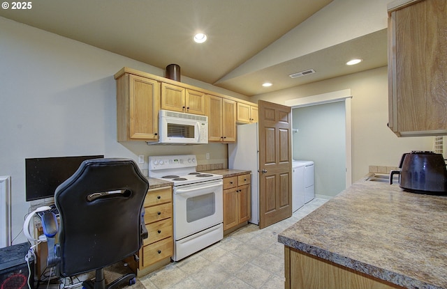 kitchen featuring light brown cabinetry, white appliances, separate washer and dryer, and vaulted ceiling